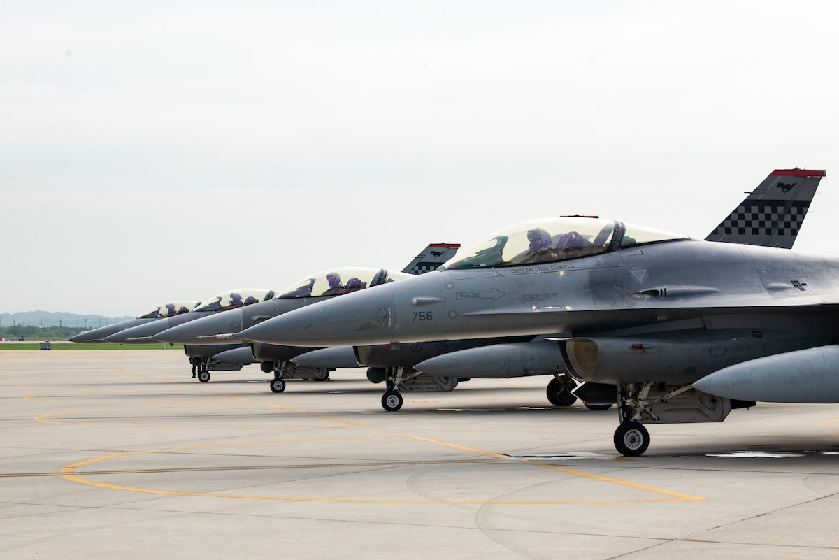 U.S. Air Force F-16 Fighting Falcons assigned to the 36th Fighter Squadron line up for final checks before takeoff at Osan Air Base, South Korea, July 24, 2025. Starting in summer 2024, the 36th FS became a super squadron of 31 F-16s, participating in a test to maximize combat effectiveness on the Korean Peninsula. (U.S. Air Force photo by Senior Airman Tylir Meyer)