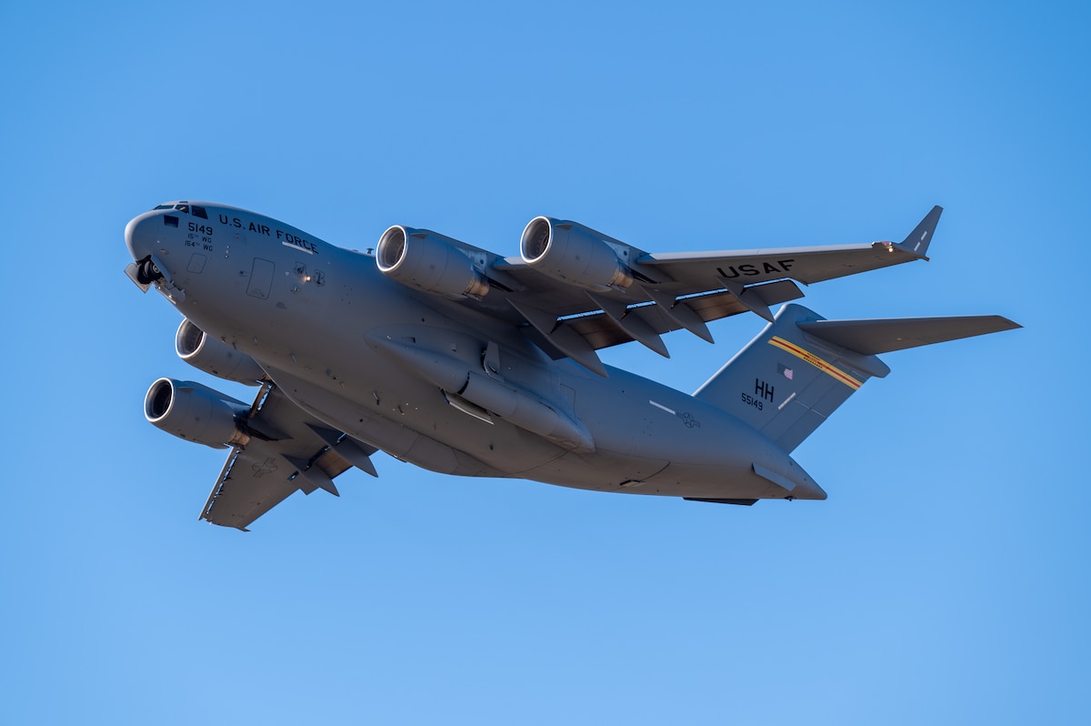 A U.S. Air Force C-17 Globemaster III assigned to the 15th Wing, Joint Base Pearl Harbor-Hickam, Hawaii, takes off for a mission over Queensland, Australia, during Talisman Sabre, 25 July 24, 2025. Talisman Sabre is the largest bilateral military exercise between Australia and the United States, aimed at strengthening relationships and interoperability among key allies and partners to promote a safe and secure Indo-Pacific. The exercise also enhances collective capabilities to respond to a wide range of potential security concerns. (U.S. Air Force photo by Senior Airman Natalie Doan)