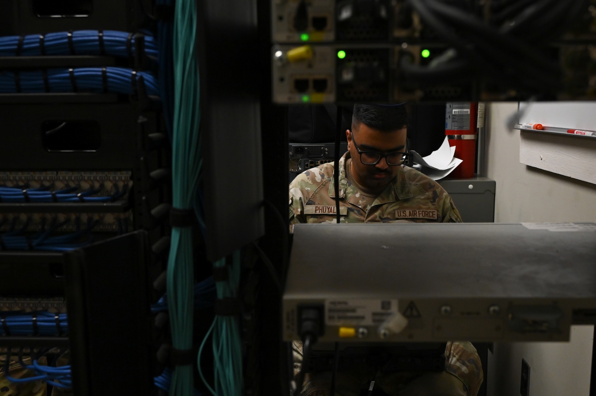 U.S. Air Force Staff Sgt. Abishesh Phuyal, an airmen with the 117th Communications Squadron, conducts maintenance on the intranet Sumpter Smith JNGB, Alabama, Jul. 31, 2025.
