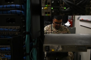 U.S. Air Force Staff Sgt. Abishesh Phuyal, an airmen with the 117th Communications Squadron, conducts maintenance on the intranet Sumpter Smith JNGB, Alabama, Jul. 31, 2025.