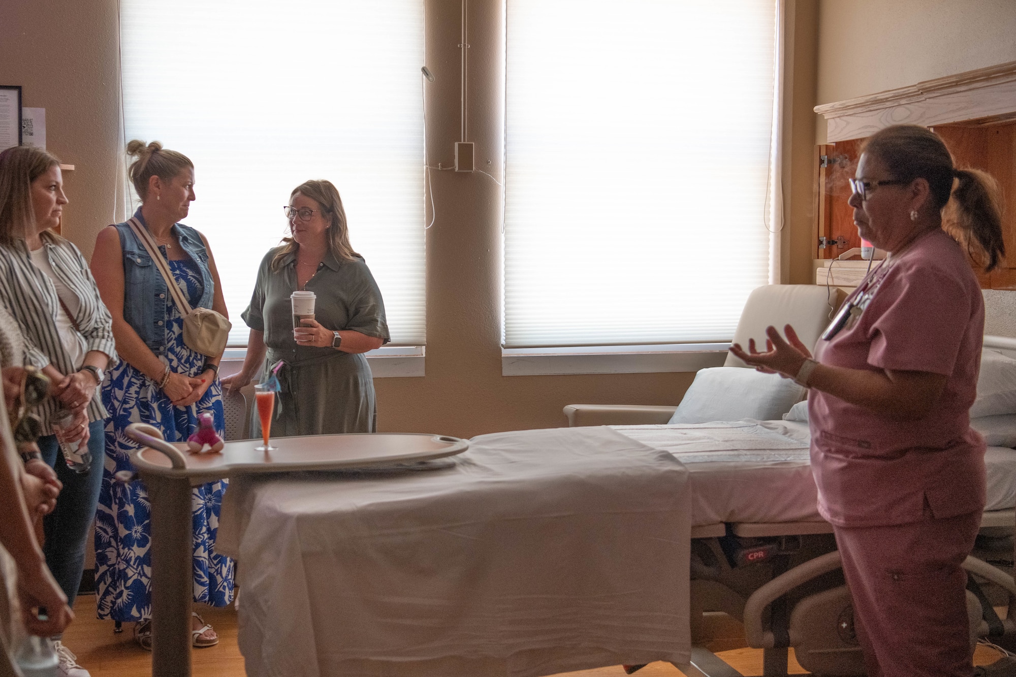 Plains Regional Medical Center labor and delivery registered nurse supervisor, Esperanza, briefs Melissa Conley, spouse of U.S. Air Force Lt. Gen. Michael Conley, commander Air Force Special Operations Command; and Becky Freeman, spouse of U.S. Air Force Chief Master Sgt. Courtney Freeman, command chief AFSOC in Clovis, N.M., Jul 28, 2025. The brief highlighted services provided by PRMC and the planned labor and delivery expansion. Cannon has built community relationships to expand healthcare and support for Air Commandos and their dependents. (U.S. Air Force photo by Maj. Jaclyn Pienkowski)