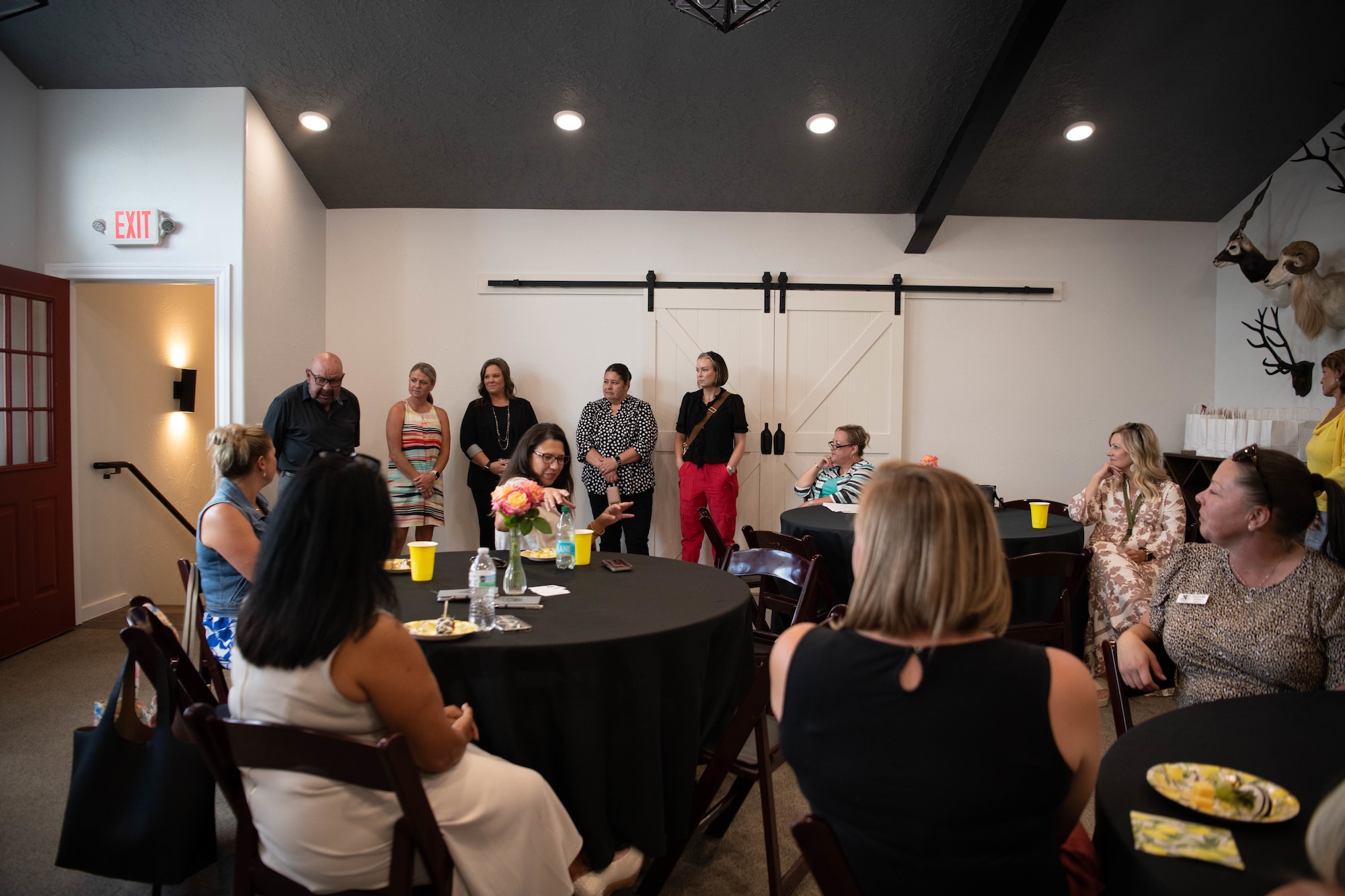 Mike Miller, Mayor of Portales, introduces Roosevelt County Chamber of Commerce members to Air Force Special Operations Command and Cannon Air Force Base leadership spouses during a community engagement in Portales, N.M., Jul 28, 2025. 
The spouses were briefed by Portales Municipal School District, Roosevelt General Hospital, and Portales Military Affairs Committee on programs and developments in the town to support Air Commandos. (U.S. Air Force photo by Maj. Jaclyn Pienkowski)