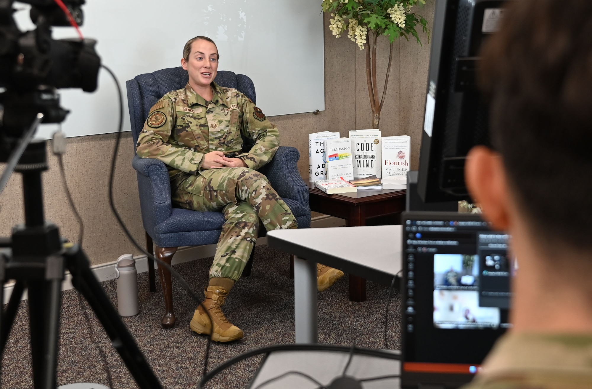 Tech. Sgt. Brianna Benko, a Master Resilience Trainer Course instructor with the Eaker Center for Professional Development speaks on camera during an Air Force Medical Service panel on burnout at Maxwell Air Force Base, Alabama, July 17, 2025. The event was broadcast with live interaction to more than 77 viewing locations worldwide.