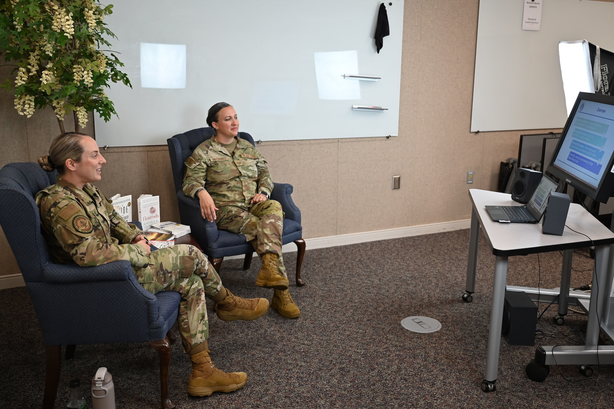 Tech. Sgts. Brianna Benko and Kathleen McConnell, Master Resilience Trainer Course instructors with the Eaker Center for Professional Development speak on camera during an Air Force Medical Service panel on burnout at Maxwell Air Force Base, Alabama, July 17, 2025. The panel provided viewers with tools to recognize burnout symptoms, build emotional resilience, and apply practical strategies for recovery and prevention.