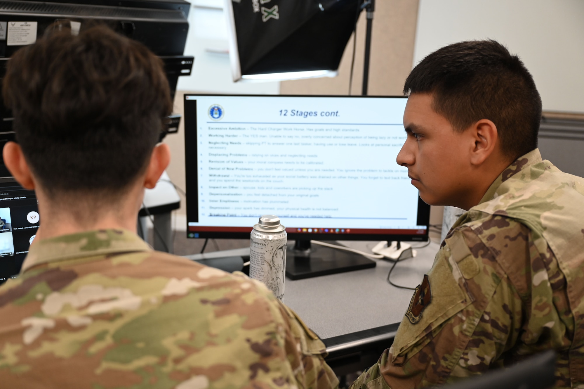 Airman 1st Class Ramon Castillo, Client Systems Technician assigned to the 42d Communications Squadron, monitors the livestream during an Air Force Medical Service panel on burnout at Maxwell Air Force Base, Alabama, July 17, 2025. Castillo had not previously managed a livestream with a studio setup and quickly adapted to meet the needs of the Eaker Center.