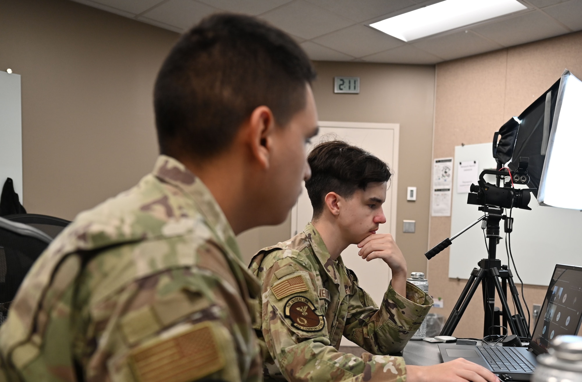 Airman 1st Class Ashton Weldon, Client Systems Technician assigned to the 42d Communications Squadron, monitors the livestream during an Air Force Medical Service panel on burnout at Maxwell Air Force Base, Alabama, July 17, 2025. The livestream was broadcast to 77 locations worldwide.