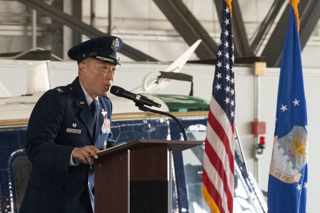U.S. Air Force Col. Jun S. Oh, 316th Wing and installation commander, gives opening remarks during the 316th Operations Group change of command ceremony at Joint Base Andrews, Md., July 31, 2025.
