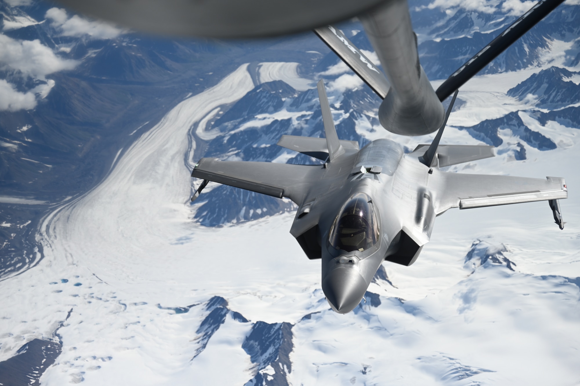 Aircraft flies in the sky.