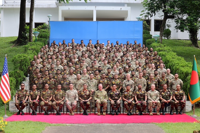 Key leaders pose for a group photo after discussing operational interoperability at the Jalalabad Cantonment, Sylhet, Bangladesh on July 25, 2025.