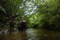 U.S. Marines patrol during Expeditionary Advanced Base Field Training Exercise at the Central Training Area, Okinawa, Japan, July 28, 2025.