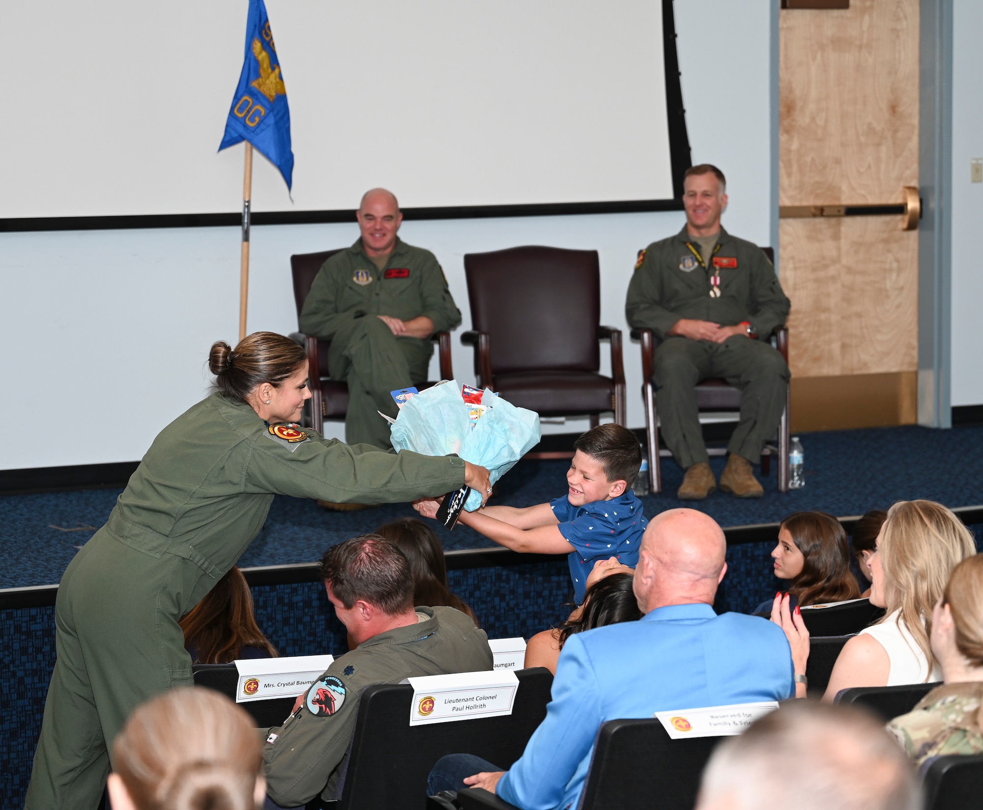 U.S. Air Force Lt. Col. Andrew W. Baumgart, outgoing 706th Aggressor Squadron (AGRS) commander, relinquished command to Lt. Col. Kristin L. Hollrith, incoming 706th AGRS commander, during a change of command ceremony at Nellis Air Force Base, Nevada, August 1, 2025.