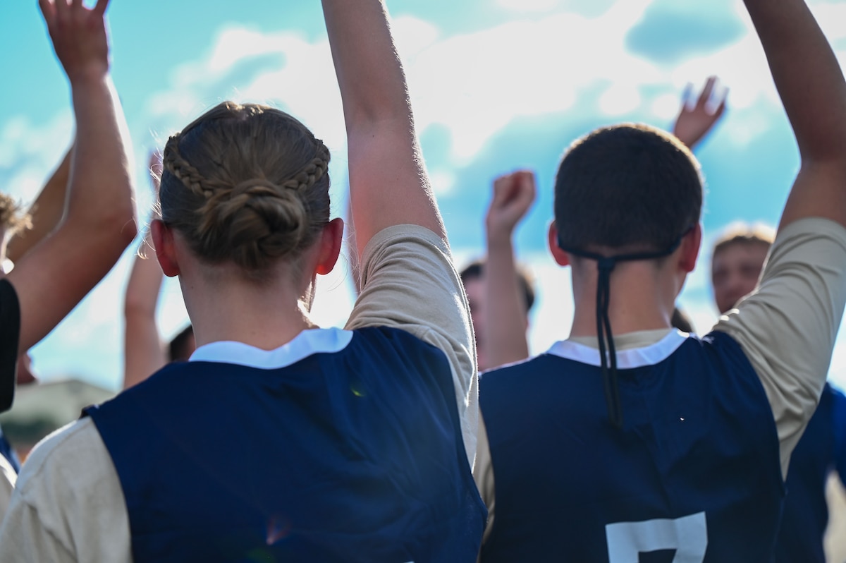 Cadet Officer School participants compete in a volleyball match during a leadership-building activity at Maxwell Air Force Base, Alabama, July 22, 2025.