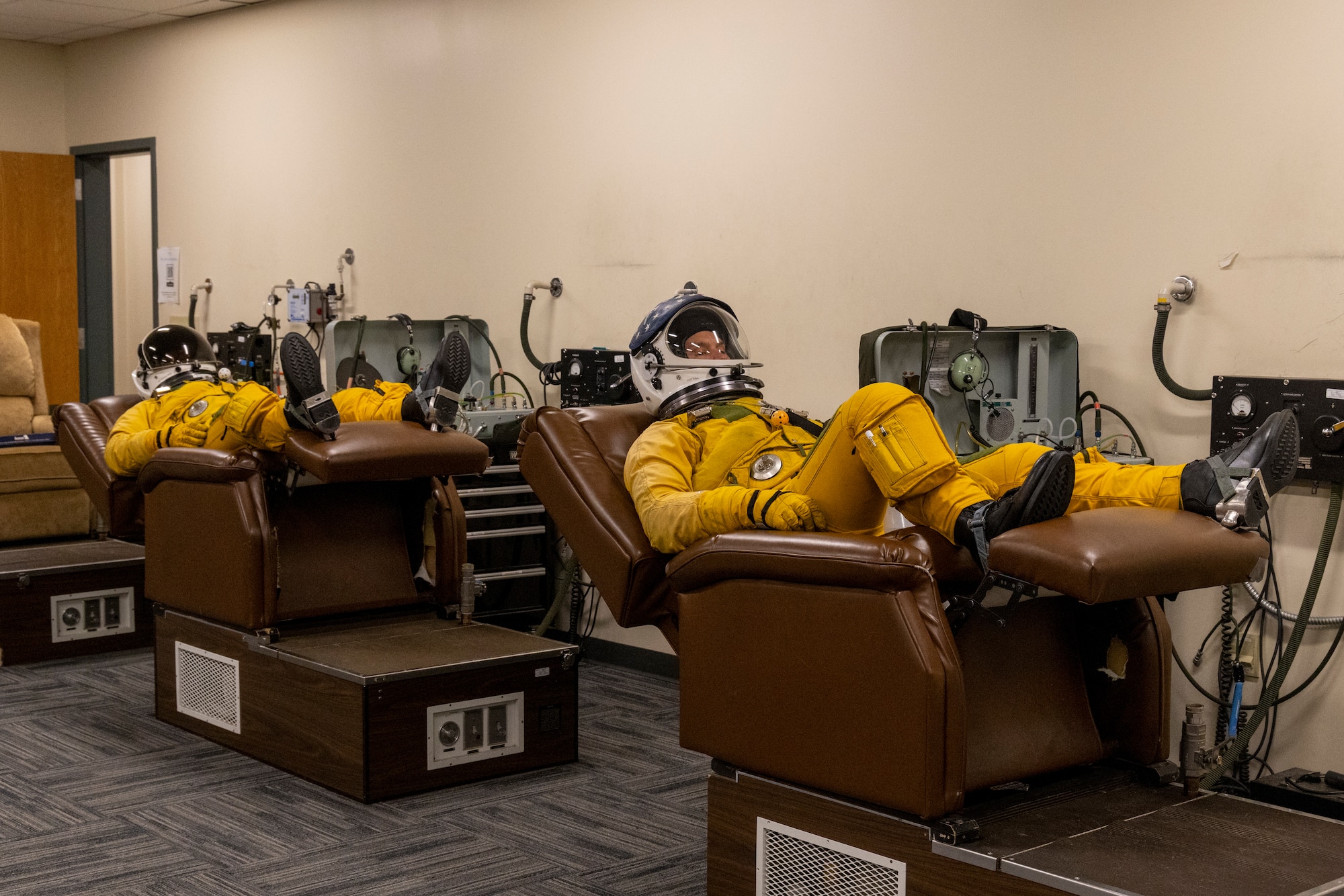 Cory “ULTRALORD” Bartholomew, 1st Reconnaissance Squadron (RS) assigned flight safety officer and U-2 instructor pilot, and Lt. Col. “JETHRO”, 1st RS instructor pilot and U-2 chief pilot, prepare to fly a TU-2S Dragon Lady by spending an hour undergoing 100% oxygen exposure with the 9th Physiological Support Squadron at Beale Air Force Base (AFB), California, Aug. 1st, 2025.