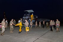 Cory “ULTRALORD” Bartholomew, 1st Reconnaissance Squadron (RS) assigned flight safety officer, shakes hands with the members of the 9th Aircraft Maintenance Squadron who prepared a 9th Reconnaissance Wing TU-2S Dragon Lady for his flight, as Lt. Col. “JETHRO”, 1st RS instructor pilot and U-2 chief pilot, boards the aircraft at Beale Air Force Base (AFB), California, July 31st, 2025.