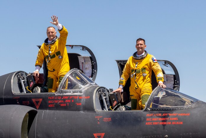 Cory “ULTRALORD” Bartholomew, 1st Reconnaissance Squadron (RS) assigned flight safety officer and U-2 instructor pilot, and Lt. Col. “JETHRO”, 1st RS instructor pilot and U-2 chief pilot, celebrate after landing a 9th Reconnaissance Wing TU-2S Dragon Lady at Beale Air Force Base (AFB), California, Aug. 1st, 2025.