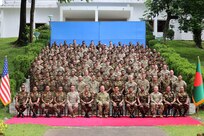 Key leaders pose for a group photo after discussing operational interoperability at the Jalalabad Cantonment, Sylhet, Bangladesh on July 25, 2025.