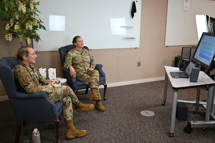 Tech. Sgts. Brianna Benko and Kathleen McConnell, Master Resilience Trainer Course instructors with the Eaker Center for Professional Development speak on camera during an Air Force Medical Service panel on burnout at Maxwell Air Force Base, Alabama, July 17, 2025. The panel provided viewers with tools to recognize burnout symptoms, build emotional resilience, and apply practical strategies for recovery and prevention.