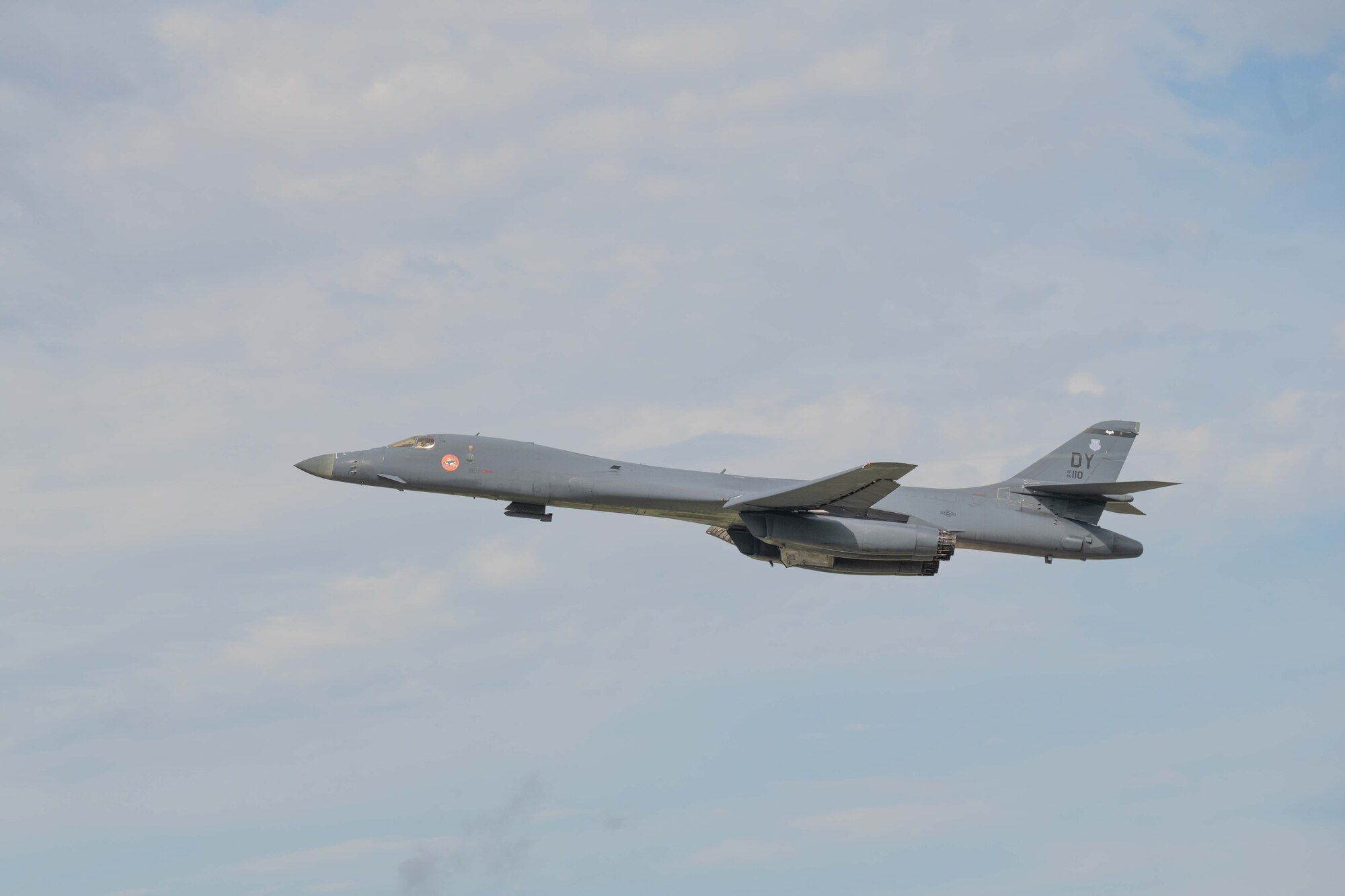 A U.S. Air Force B-1B Lancer departs Dyess Air Force Base, Texas, July 23, 2025, to participate in Red Flag-Nellis 25-3. During the exercise, Dyess bombers employed a hybrid operations model featuring daily sorties flown from home station while mission planning cell teams operated forward from Nellis. (U.S. Air Force photo by Airman Caleb Schellenberg)