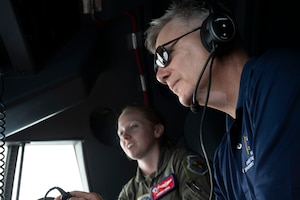 Airmen fly on a C-130J in Guam