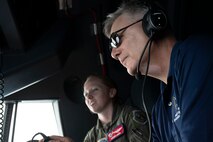 Airmen fly on a C-130J in Guam