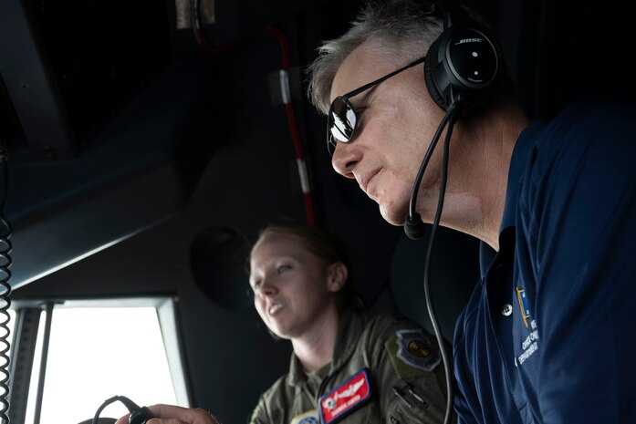 Airmen fly on a C-130J in Guam