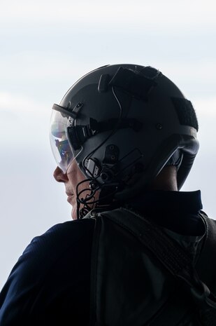 Airmen fly on a C-130J in Guam