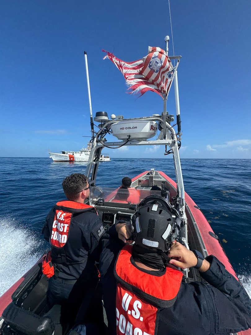 A small boat crew from the U.S. Coast Guard Cutter Richard Dixon transports survivors from an overdue vessel aboard near Mona Island, August 1, 2025. Three fisherman were reported overdue after they failed to return Las Crayolas, Puerto Rico. (U.S. Coast Guard photo)