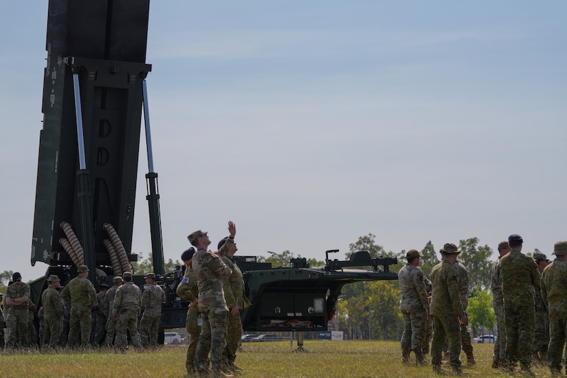 NORTHERN TERRITORY, Australia — Soldiers from B Battery (Dark Eagle), 5th Battalion, 3d Field Artillery Regiment (LRFB), give a capabilities brief on the Long Range Hypersonic Weapon System in Northern Territory, Australia, July 9, 2025.