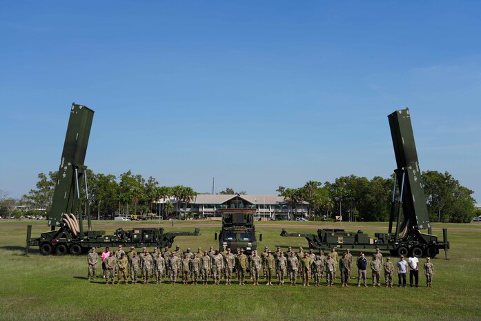 NORTHERN TERRITORY, Australia — Service members from the U.S. Department of Defense and the Australian Defence Force pose with the Long Range Hypersonic Weapon System in Northern Territory, Australia, July 9, 2025.