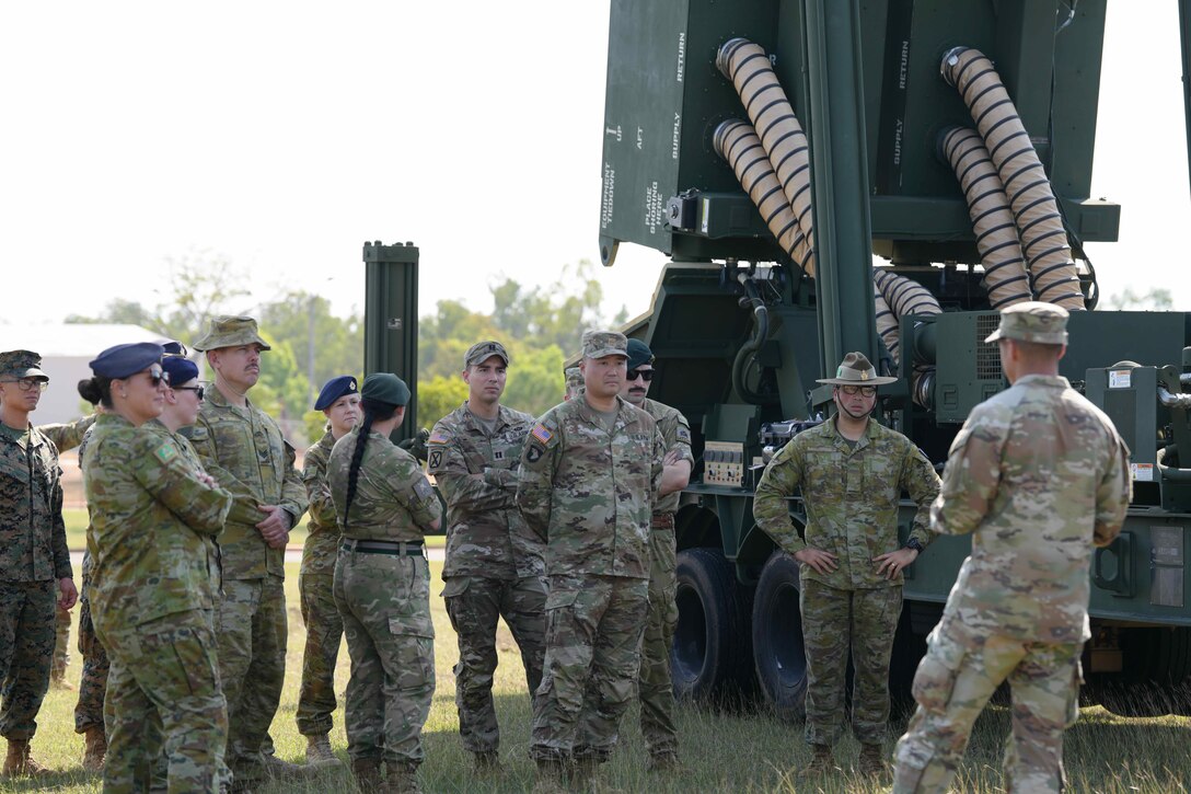 NORTHERN TERRITORY, Australia — Soldiers from B Battery (Dark Eagle), 5th Battalion, 3d Field Artillery Regiment (LRFB), give a capabilities brief on the Long Range Hypersonic Weapon System in Northern Territory, Australia, July 9, 2025.