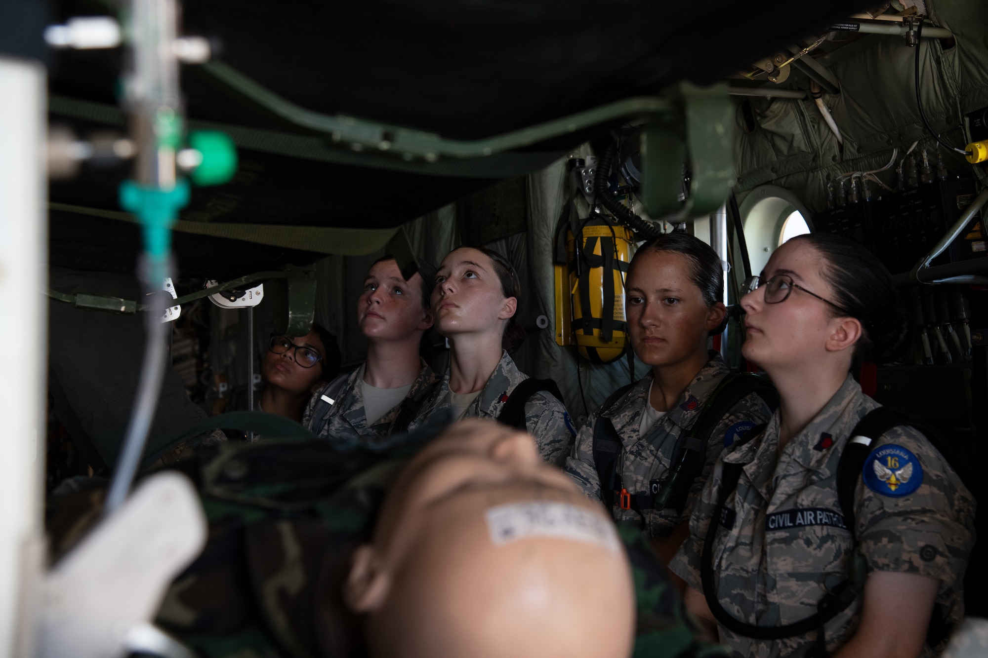 Civil Air Patrol cadets look at the static display put on by the 81st Airlift Squadron.