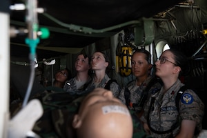 Civil Air Patrol cadets look at the static display put on by the 81st Airlift Squadron.