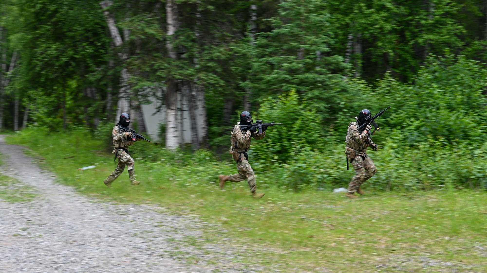 Airmen from the 155th Security Forces Squadron conduct a Force-on-Force training exercise at Joint Base Elmendorf-Richardson, Alaska, June 23, 2025.