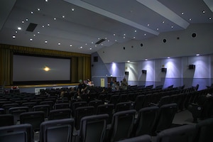 Members of Team Yokota find their seats during the first movie screening in more than a year at the base theater at Yokota Air Base, Japan, July 25, 2025. The theater offers a space that enhances morale, fosters connection, and contributes to the quality of life for Airmen, families, and the broader base community.