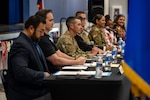 Joint Base San Antonio leadership answers questions from audience during the Back-to-School Community Connections at Joint Base San Antonio-Randolph, Texas, July 29, 2025. The back-to-school town hall fosters open dialogue between base officials and families while encouraging parental engagement and collaboration for a successful school year. (U.S. Air Force photo by Zelideth Rodriguez)