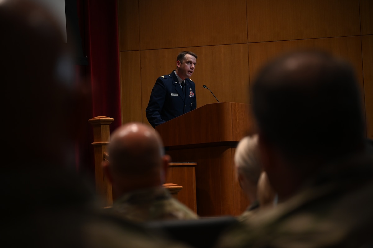 U.S. Air Force Maj. Tanner Allshouse, Warrant Officer Training School commandant, speaks at a recent WOTS graduation on Maxwell Air Force Base, Alabama, July 31, 2025.