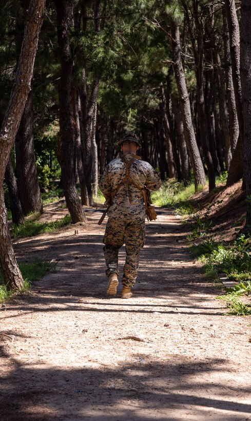 A U.S. Marine with 2nd Battalion, 23rd Marines, forward deployed with 4th Marine Regiment, 3d Marine Division as part of the Unit Deployment Program, conducts bilateral patrol training as part of the Korean Marine Exercise Program 25.2 in Pohang, South Korea, July 28, 2025. KMEP is conducted regularly between the ROK and U.S. Marine Corps to increase their combined capabilities through realistic training geared towards deterrence and maintaining peace in the Indo-Pacific. (U.S. Marine Corps photo by Cpl. Kanoa Thomas)