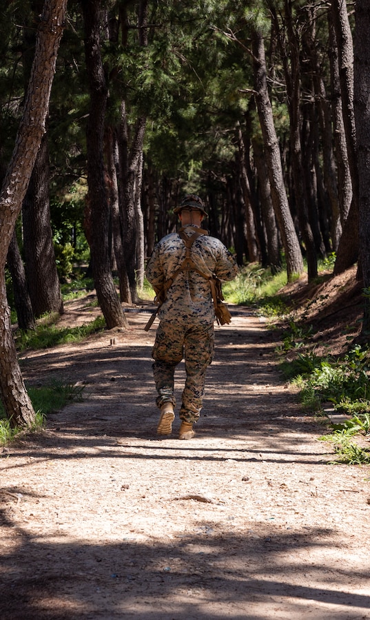 A U.S. Marine with 2nd Battalion, 23rd Marines, forward deployed with 4th Marine Regiment, 3d Marine Division as part of the Unit Deployment Program, conducts bilateral patrol training as part of the Korean Marine Exercise Program 25.2 in Pohang, South Korea, July 28, 2025. KMEP is conducted regularly between the ROK and U.S. Marine Corps to increase their combined capabilities through realistic training geared towards deterrence and maintaining peace in the Indo-Pacific. (U.S. Marine Corps photo by Cpl. Kanoa Thomas)