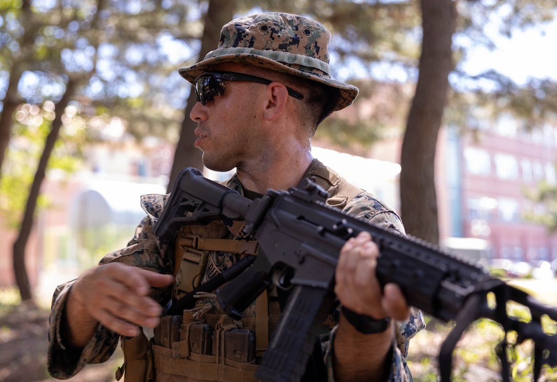 U.S. Marine Corps Cpl. Robert Ruiz, a rifleman with 2nd Battalion, 23rd Marines, forward deployed with 4th Marine Regiment, 3d Marine Division as part of the Unit Deployment Program, maintains security during bilateral patrol training as part of the Korean Marine Exercise Program 25.2 in Pohang, South Korea, July 28, 2025. KMEP is conducted regularly between the ROK and U.S. Marine Corps to increase their combined capabilities through realistic training geared towards deterrence and maintaining peace in the Indo-Pacific. Ruiz is a native of California. (U.S. Marine Corps photo by Cpl. Kanoa Thomas)