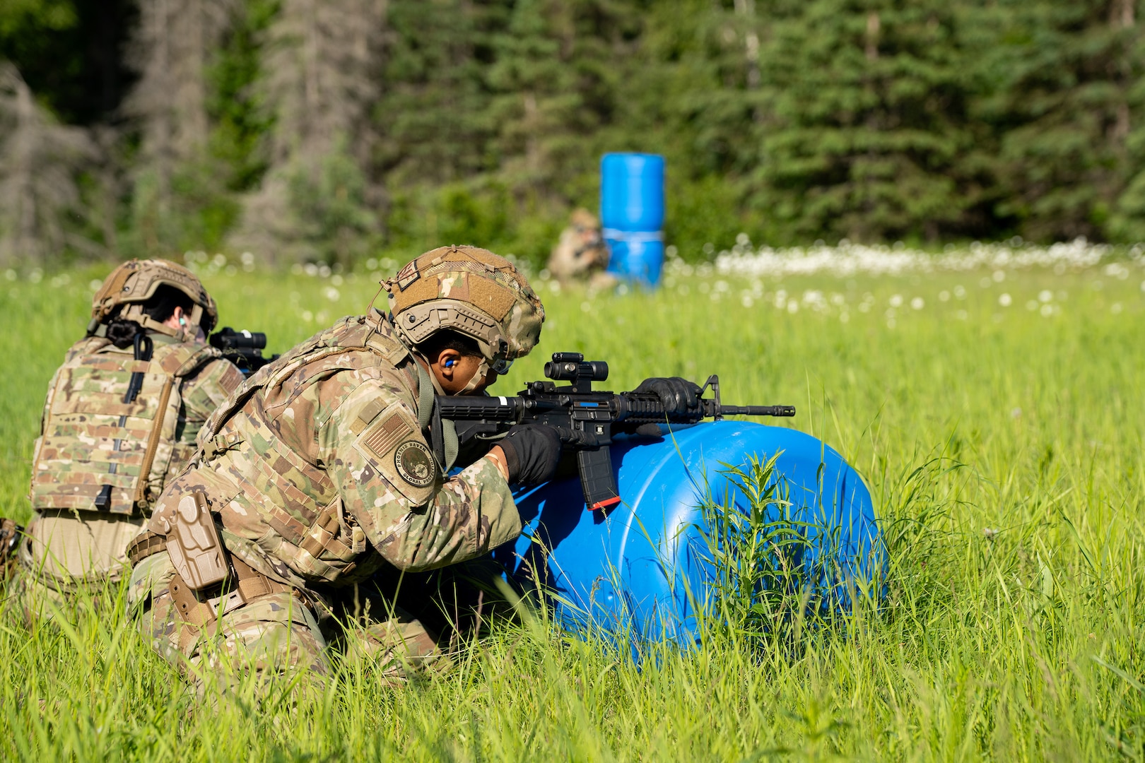 Airmen from the 155th Security Forces Squadron train on shoot, move, and communicate tactics at Joint Base Elmendorf-Richardson, Alaska, June 25, 2025.