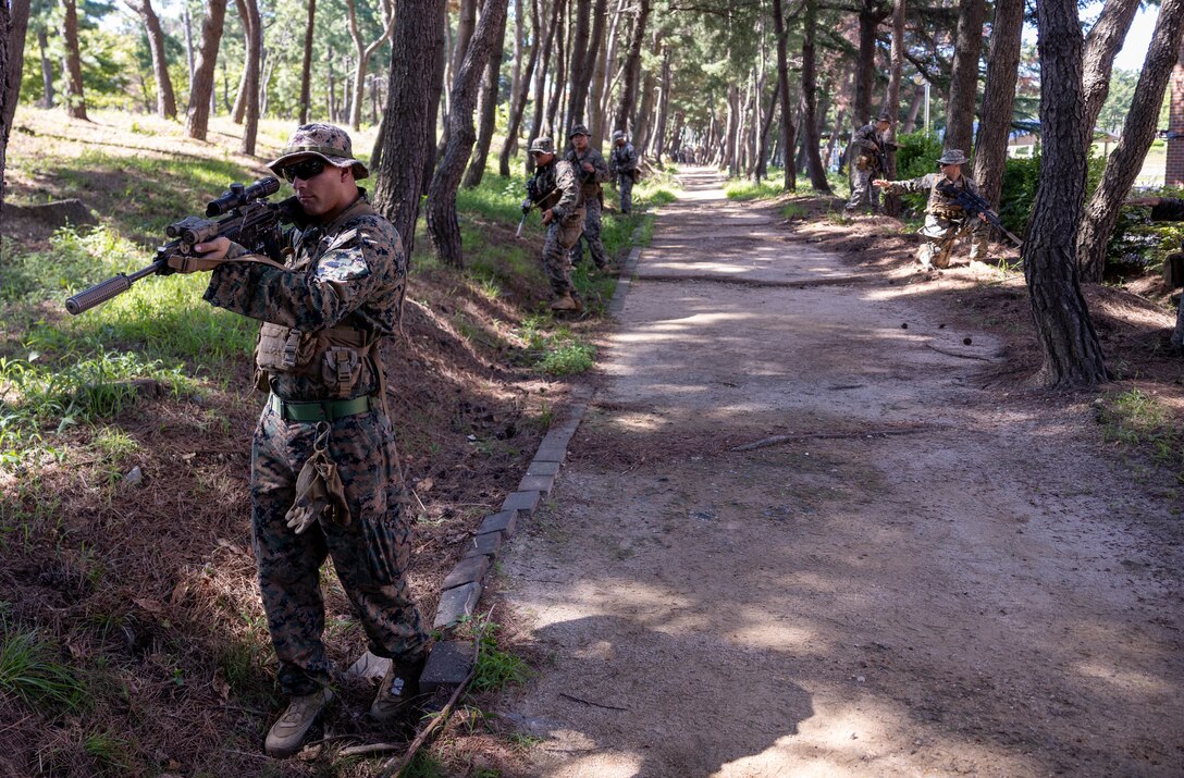 U.S. Marines with 2nd Battalion, 23rd Marines, forward deployed with 4th Marine Regiment, 3d Marine Division as part of the Unit Deployment Program, conduct bilateral patrol training as part of the Korean Marine Exercise Program 25.2 in Pohang, South Korea, July 28, 2025. KMEP is conducted regularly between the ROK and U.S. Marine Corps to increase their combined capabilities through realistic training geared towards deterrence and maintaining peace in the Indo-Pacific. (U.S. Marine Corps photo by Cpl. Kanoa Thomas)