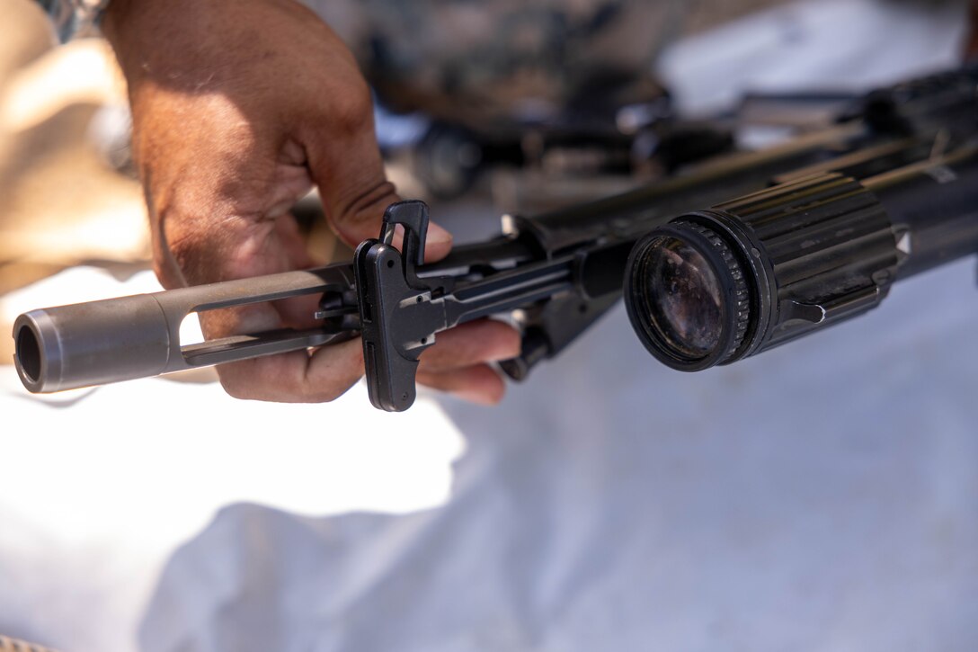 A U.S. Marine with 2nd Battalion, 23rd Marines, forward deployed with 4th Marine Regiment, 3d Marine Division as part of the Unit Deployment Program, assembles their M27 Infantry Automatic Rifle as part of bilateral patrol training during the Korean Marine Exercise Program 25.2 in Pohang, South Korea, July 28, 2025. KMEP is conducted regularly between the ROK and U.S. Marine Corps to increase their combined capabilities through realistic training geared towards deterrence and maintaining peace in the Indo-Pacific. (U.S. Marine Corps photo by Cpl. Kanoa Thomas)