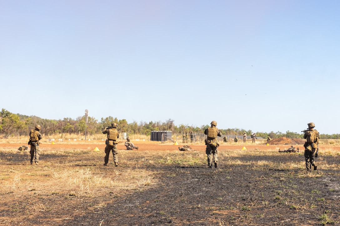 U.S. Marines with 2nd Battalion, 1st Marine Regiment, Marine Rotational Force – Darwin 25.3, engage enemy forces during an airfield seizure as part of exercise Talisman Sabre 25 in the Northern Territory, Australia, July 14, 2025. Talisman Sabre is the largest bilateral military exercise between Australia and the United States advancing a free and open Indo-Pacific by strengthening relationships and interoperability among key allies and partners, while enhancing our collective capabilities to respond to a wide array of potential security concerns. Marine Rotational Force –  Darwin 25.3 is an annual six-month rotational deployment to enhance interoperability with the Australian Defence Force and provide a forward postured crisis response force in the Indo-Pacific. (U.S. Marine Corps photo by Sgt. Ezekieljay Correa)