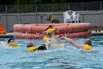 Pilots and boom operators assigned to the 106th and 99th Air Refueling Squadrons swim for their rescue raft during water survival training in Trussville, Ala., August 2, 2025. Airmen assigned to the 117th Operation Support Squadron provide the training twice a year for the regular Air Force and Air National Guard flyers assigned to the 117th Air Refueling Wing, Alabama Air National Guard.