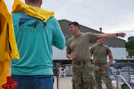 U.S. Air Force Master Sgt. Justin Bruce, aircrew flight equipment technician with the 117th Operation Support Squadron, gives starting instructions to KC-135R crew members before they jump into the pool for water survival training in Trussville, Ala., August 2, 2025.
