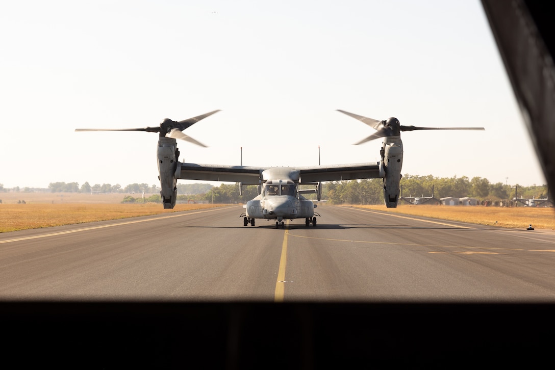 U.S. Marines with 2nd Battalion, 1st Marine Regiment, Marine Rotational Force – Darwin 25.3, are transported by MV-22B Ospreys assigned to Marine Medium Tiltrotor Squadron 363, MRF-D 25.3, during an airfield seizure as part of exercise Talisman Sabre 25 in the Northern Territory, Australia, July 14, 2025. Talisman Sabre is the largest bilateral military exercise between Australia and the United States advancing a free and open Indo-Pacific by strengthening relationships and interoperability among key allies and partners, while enhancing our collective capabilities to respond to a wide array of potential security concerns. Marine Rotational Force – Darwin 25.3 is an annual six-month rotational deployment to enhance interoperability with the Australian Defence Force and provide a forward postured crisis response force in the Indo-Pacific. (U.S. Marine Corps photo by Sgt. Ezekieljay Correa)