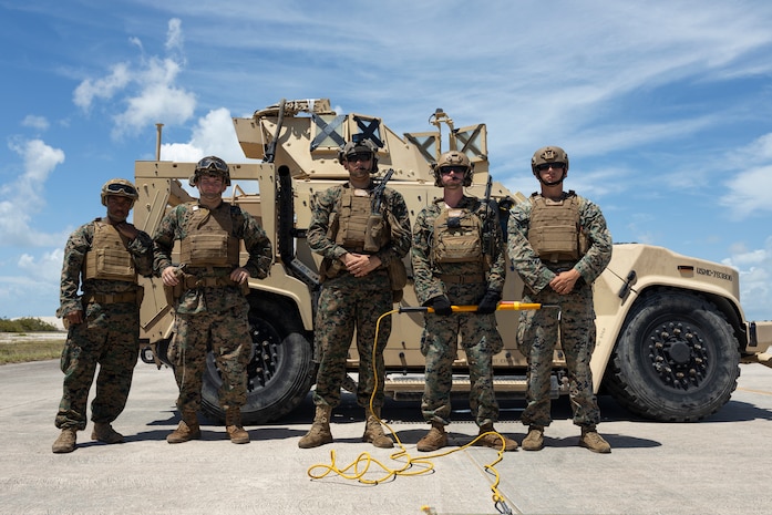 U.S. Marines with 2nd DSB execute external lifts with a JLTV
