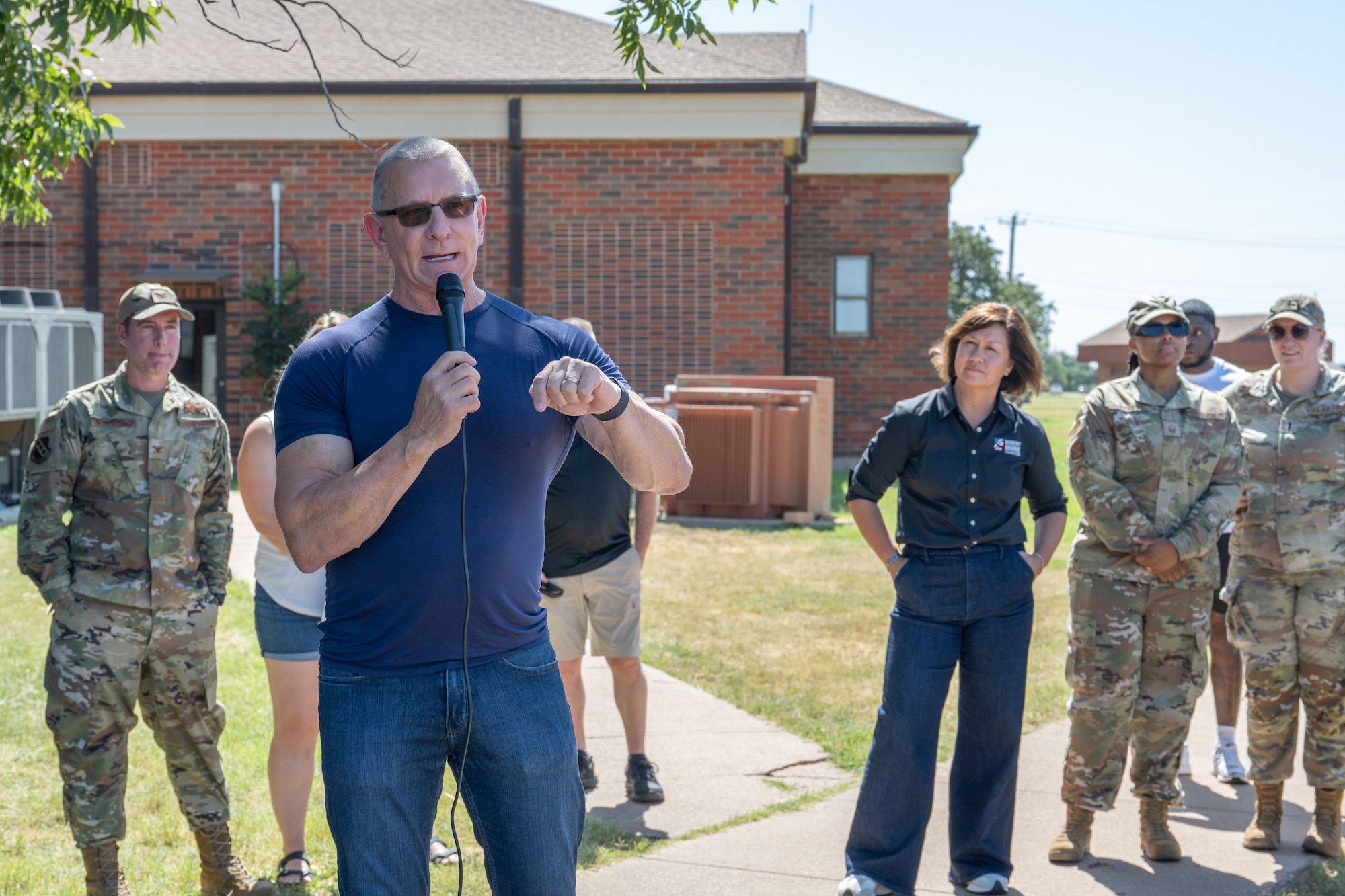 Celebrity Chef Robert Irvine speaks to Team Dyess during the “Breaking Bread with Heroes” event at Dyess Air Force Base, Texas, July 31, 2025. Irvine regularly visits military installations, hosts morale-boosting events, and advocates for greater public awareness of the challenges faced by service members. (U.S. Air Force photo by Airman Caleb Schellenberg)