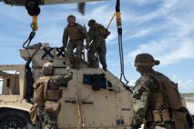 U.S. Marines with 2nd DSB execute external lifts with a JLTV