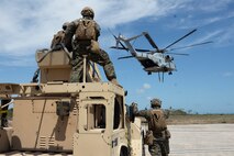 U.S. Marines with 2nd DSB execute external lifts with a JLTV